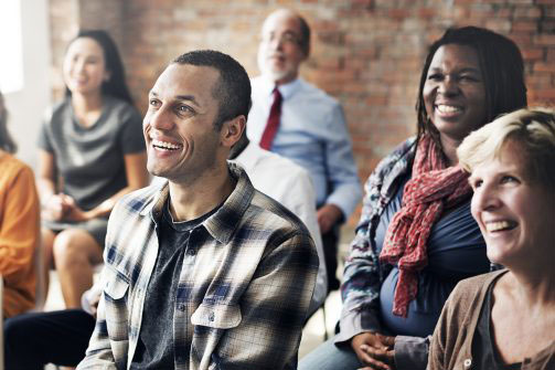 People listening to a presentation