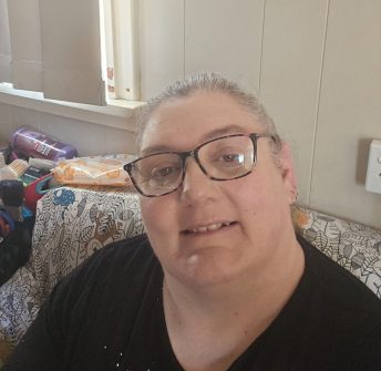 Woman wearing glasses smiling